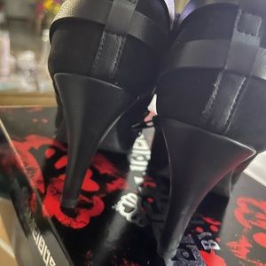 Gently worn black booties